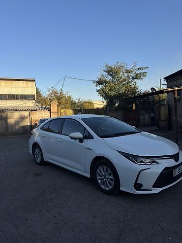 росрочка: Toyota Corolla: 2019 г., 1.8 л, Гибрид, Седан — 2