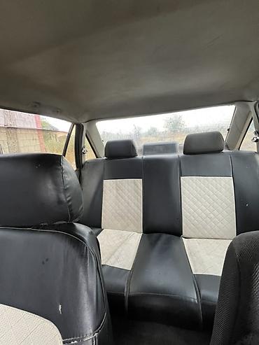 болушу: Daewoo Nexia: 1994 г., 1.5 л, Кол менен иштөөчү, Бензин, Седан — 6
