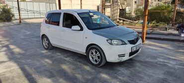 запчасти опель омега б: Mazda Demio: 2003 г., 1.3 л, Автомат, Бензин, Универсал
