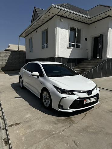 kia 2010: Toyota Corolla: 2022 г., 1.8 л, Автомат, Гибрид, Седан — 2