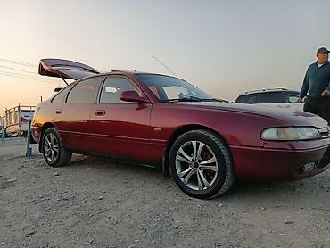 21 диски: Mazda 626: 1996 г., 2 л, Механика, Бензин, Хэтчбэк — 3
