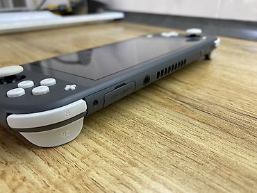 Nintendo Switch (Lite): Продаю Nintendo Switch Lite чипованая Карта памяти 256gb Состояние — 7