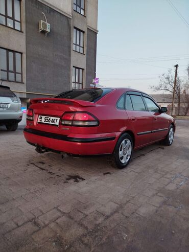 электронная мопет: Mazda 626: 1997 г., 2 л, Механика, Бензин, Седан
