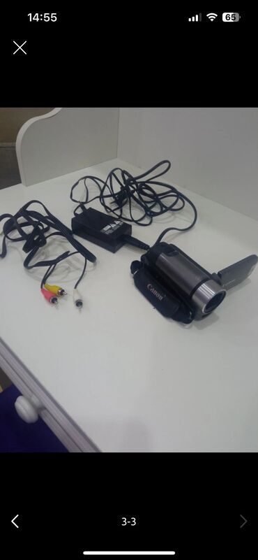 dəvə əti satılır: Canon firmasinin hem kamera cekir, hem de foto çekir. cantasi, usb