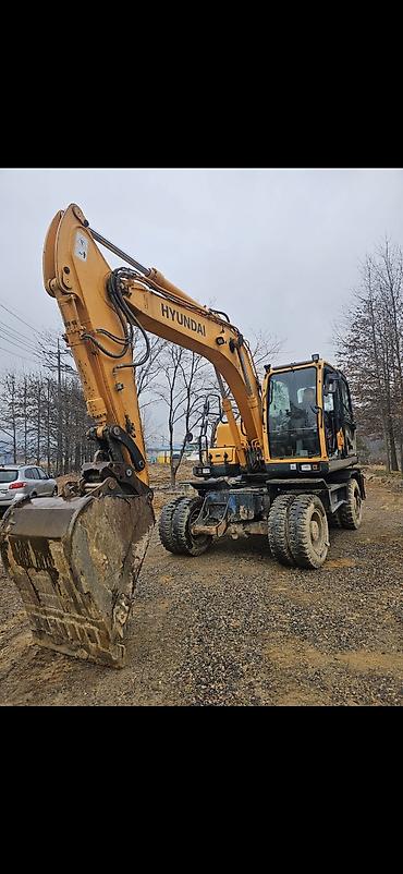 Экскаваторы: Экскаватор, Hyundai, 2011 г., Колесный — 13