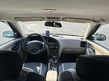 karopkalar: Hyundai Elantra: 2 l | 2003 il Sedan — 10