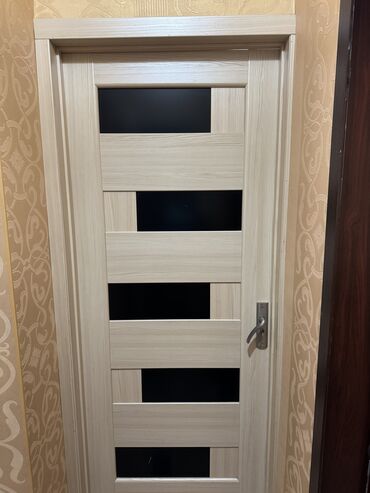 Otaq qapıları 3 ədəəd uzunu 2.5 sm eni 90 sm İki ilin qapısıdı təp