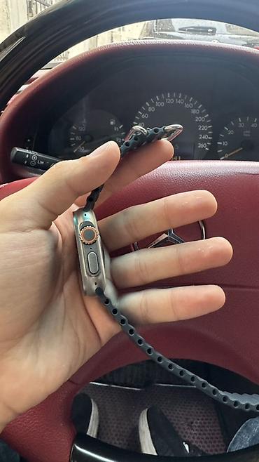 timex saat: Apple Watch Ultra (49 mm) – titan korpus və Ocean Band tipli qara — 5