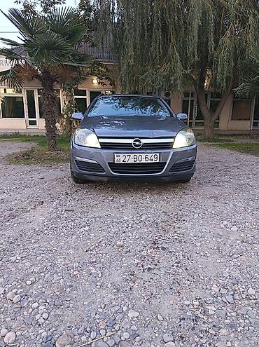 vaz 2107 2010: Opel Astra: 1.4 l | 2005 il Universal — 1