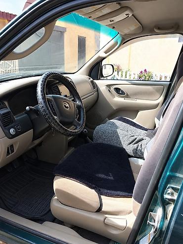 делаем справки: Mazda Tribute: 2001 г., 2 л, Механика, Бензин, Кроссовер — 6