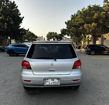 disk: Mitsubishi Airtrek (stansiya/wagon kuzov) – gümüşü rəng Texniki — 2