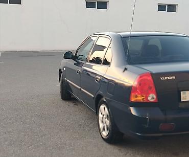 disk masin: Hyundai Accent sedan - Kuzov: 4 qapılı sedan, tünd mavi rəng - — 4