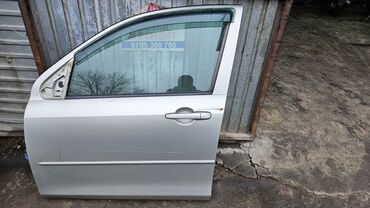 perodua viva: Передняя левая дверь Mazda 2003 г., Б/у, цвет - Серебристый,Оригинал