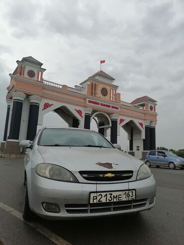 Продажа авто: Продается серебристый Chevrolet Lacetti. Этот автомобиль отличается