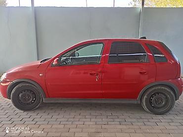 opel kupe: Opel Corsa C, hetçbek, qırmızı rəng. -rahat, təzə qoltuqlar Şəhər — 5