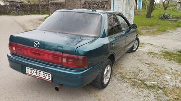 Mazda: Mazda 323: 1.6 l | 1994 il Sedan — 9