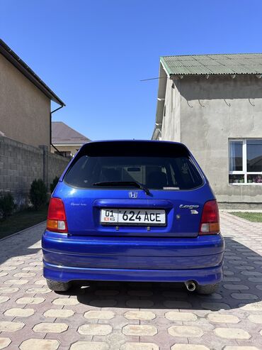 подсветка двери с логотипом марки автомобиля: Honda Logo: 2000 г., 1.3 л, Автомат, Бензин, Хэтчбэк