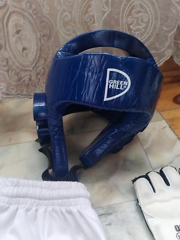 idman formalari: Dəstə daxil olanlar: - 1 ədəd WT dobok (üst + şalvar) - 1 ədəd Green — 4