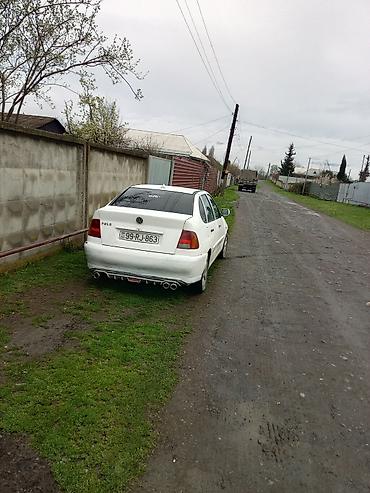 qolf 4 ehtiyyat hissələri: Volkswagen Polo sedan, ağ rəng. - Kuzov: 4 qapılı sedan, aerodinamik — 1