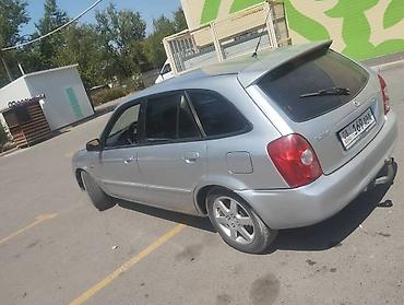 e53 amg: Mazda 323: 2003 г., 1.5 л, Механика, Универсал — 6