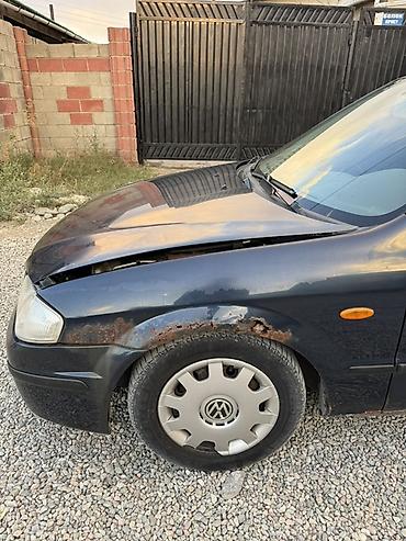 Унаа сатуу: Mazda 323: 1999 г., 1.6 л, Кол менен иштөөчү, Бензин, Седан — 5