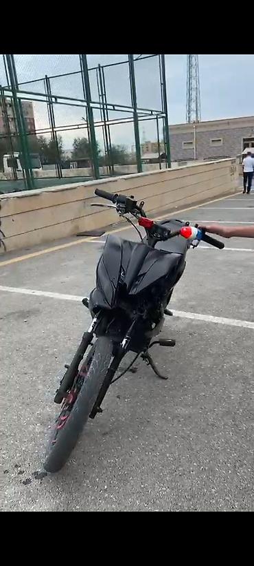 moto tvs: Məhsul: Şəhər və yüngül off-road üçün skuter tipli motosiklet — 1