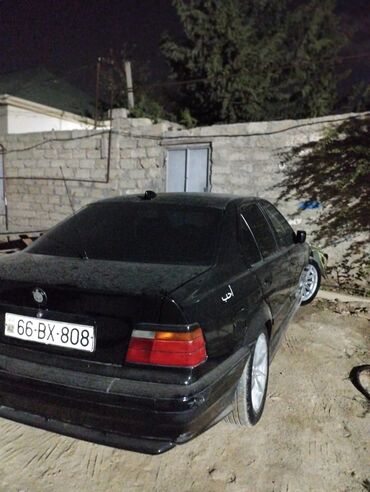 Ford: BMW 318: 1.8 л | 1994 г. Седан