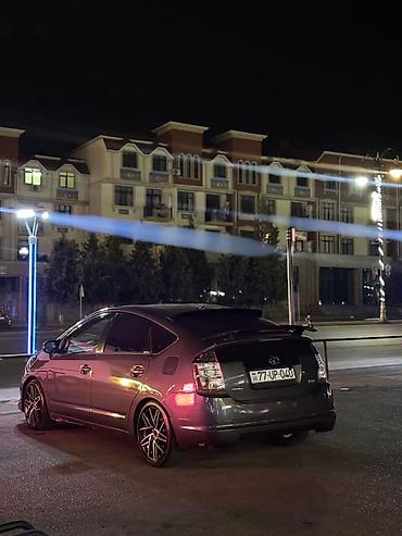 prius salon: Toyota Prius (2-ci nəsil) hibrid hetçbek - Kuzov: hetçbek, tünd boz — 8