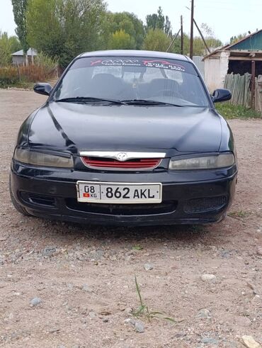 девевые машины: Mazda 626: 1996 г., 2 л, Механика, Бензин, Седан