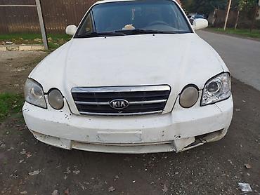 ford motorları: Kia Magentis: 2 l | 2004 il Sedan — 1