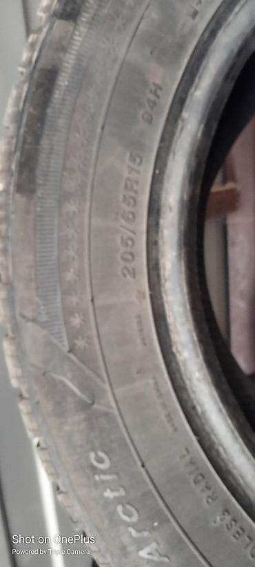 2 gr: Шины зимние 205/65/R15 Одна 2000с . Продается парой. Без шишек,целые — 2