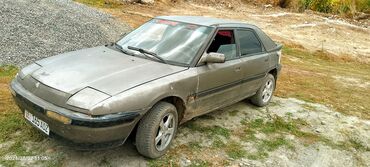 автомобиль смарт: Mazda 323: 1990 г., 1.6 л, Механика, Бензин, Хэтчбэк