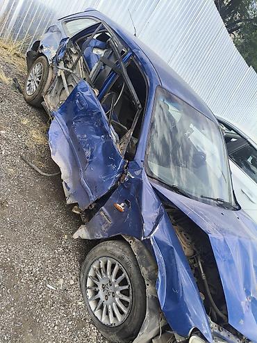 маз: Mazda 323: 2002 г., 1.6 л, Механика, Бензин, Хэтчбэк — 5