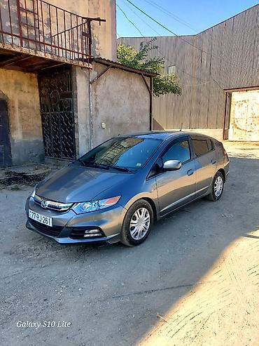 elektrikli maşınlar: Honda Insight: 1.3 l | 2014 il Hetçbek — 1