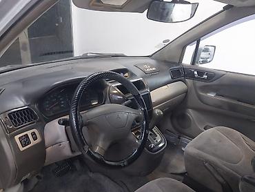 mitsubishi lancer evolution: Mitsubishi Chariot Grandis – 7 yerlik geniş ailə miniveni — 10