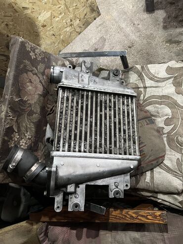 двигатель f23: Интеркулер Ниссан патрол увлеченого объема zd30, состояние отличное!