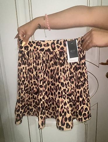 ağ ətəklər: Brend: QUZU S M razmer Model: qısa ətək Naqış: leopard printi — 1