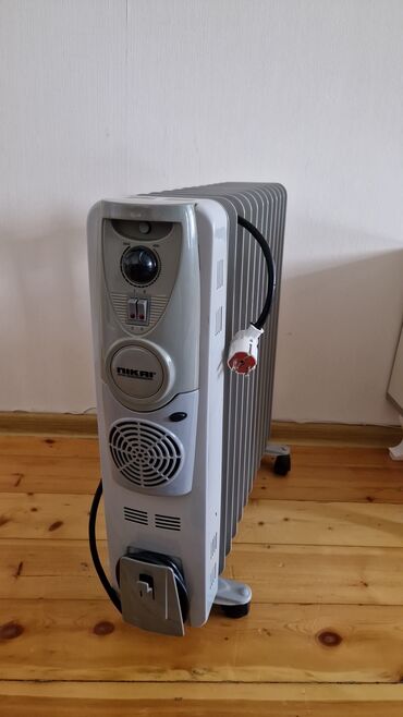 Elektrikli qızdırıcılar və radiatorlar: Qizdirici