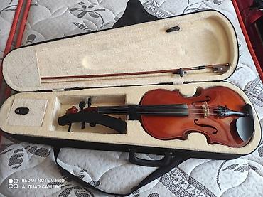 fender gitara simleri: Məhsul: Skripka dəsti Tərkibi: - Tam ölçülü skripka (4 telli, taxta — 1