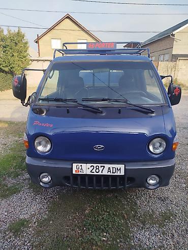 smart open: Hyundai Porter — компактный бортовой грузовик синего цвета. Основные — 3