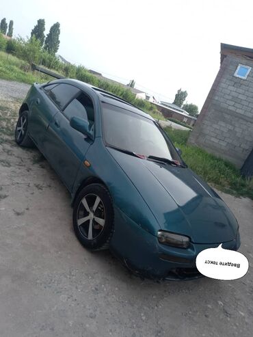 Mazda: Mazda 323: 1994 г., 1.8 л, Механика, Бензин, Седан