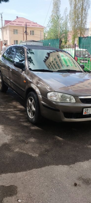 Mazda: Mazda 323: 1999 г., 1.6 л, Механика, Бензин, Хэтчбэк