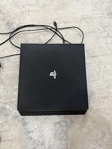 игровой моноблок: PlayStation 4 Pro (черная) + 2 беспроводных контроллера DualShock 4 + — 3