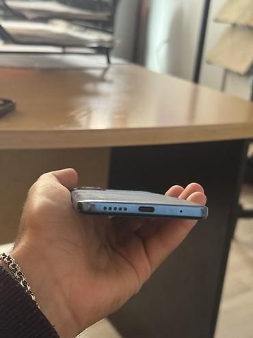 macbook air m3: Xiaomi Redmi smartfon - Model: Redmi (şəkillərdə mavi rəng, arxa — 5
