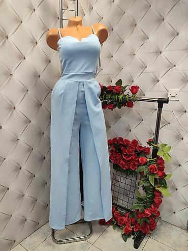 Kombinezoni: Elegantni ženski kombinezon sa širokim nogavicama - Model: kombinezon — 7