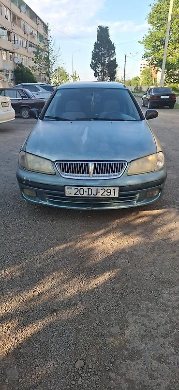megane disk: Nissan Sunny EX Saloon sedan - Kuzov: 4 qapılı sedan, mavi/yaşıl rəng — 1