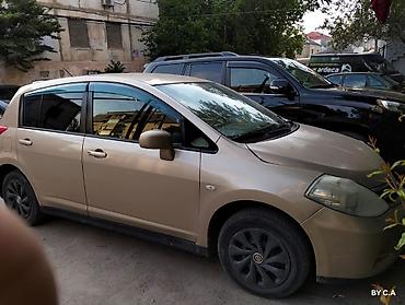 vectra stop: Nissan Tiida – hetçbek - Kuzov: 5 qapılı hetçbek, qızılı rəng - — 8
