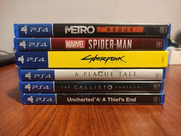 Oyun diskləri və kartricləri: PS4 Metro Redux - 25 azn PS4 Spiderman - 30 azn PS4 Cyberpunk 2077 -