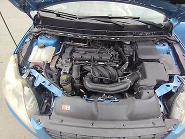 Ford: Ford Focus: 1.6 l | 2010 il 284360 km Sedan — 12