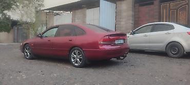 spark ltz: Mazda 626: 1996 г., 2 л, Механика, Бензин, Хэтчбэк — 2